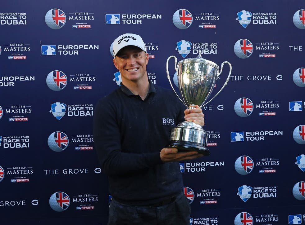Alex Noren celebrates winning the British Masters