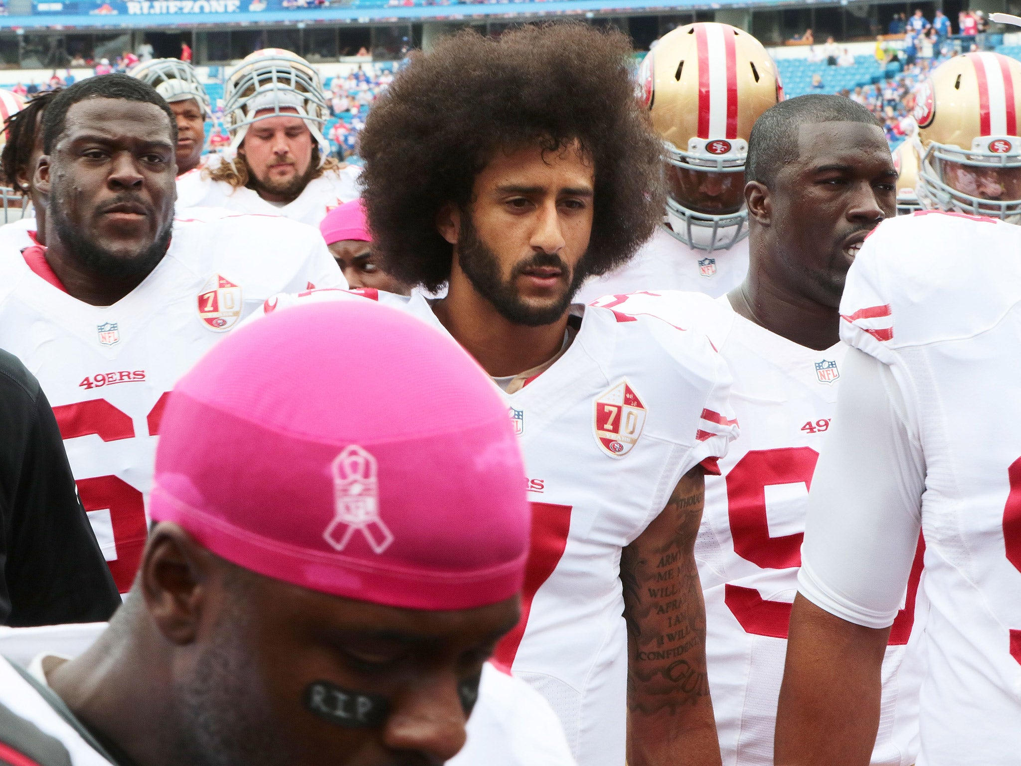 Colin Kaepernick alters stance and will now stand during the national  anthem, The Independent