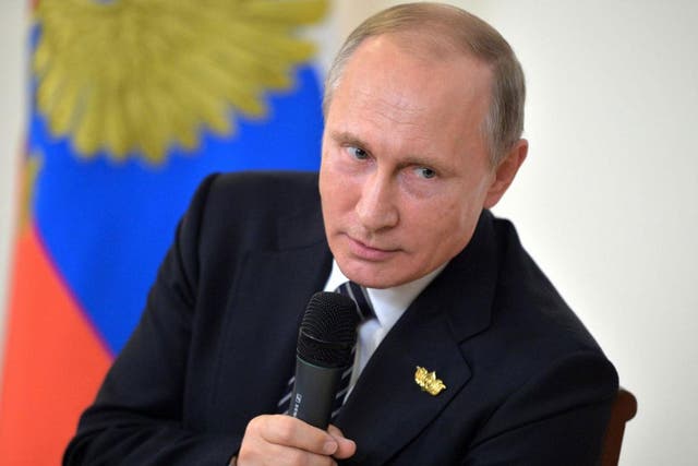 Russian President Vladimir Putin has dismissed US threats to retaliate against alleged Russian hackers