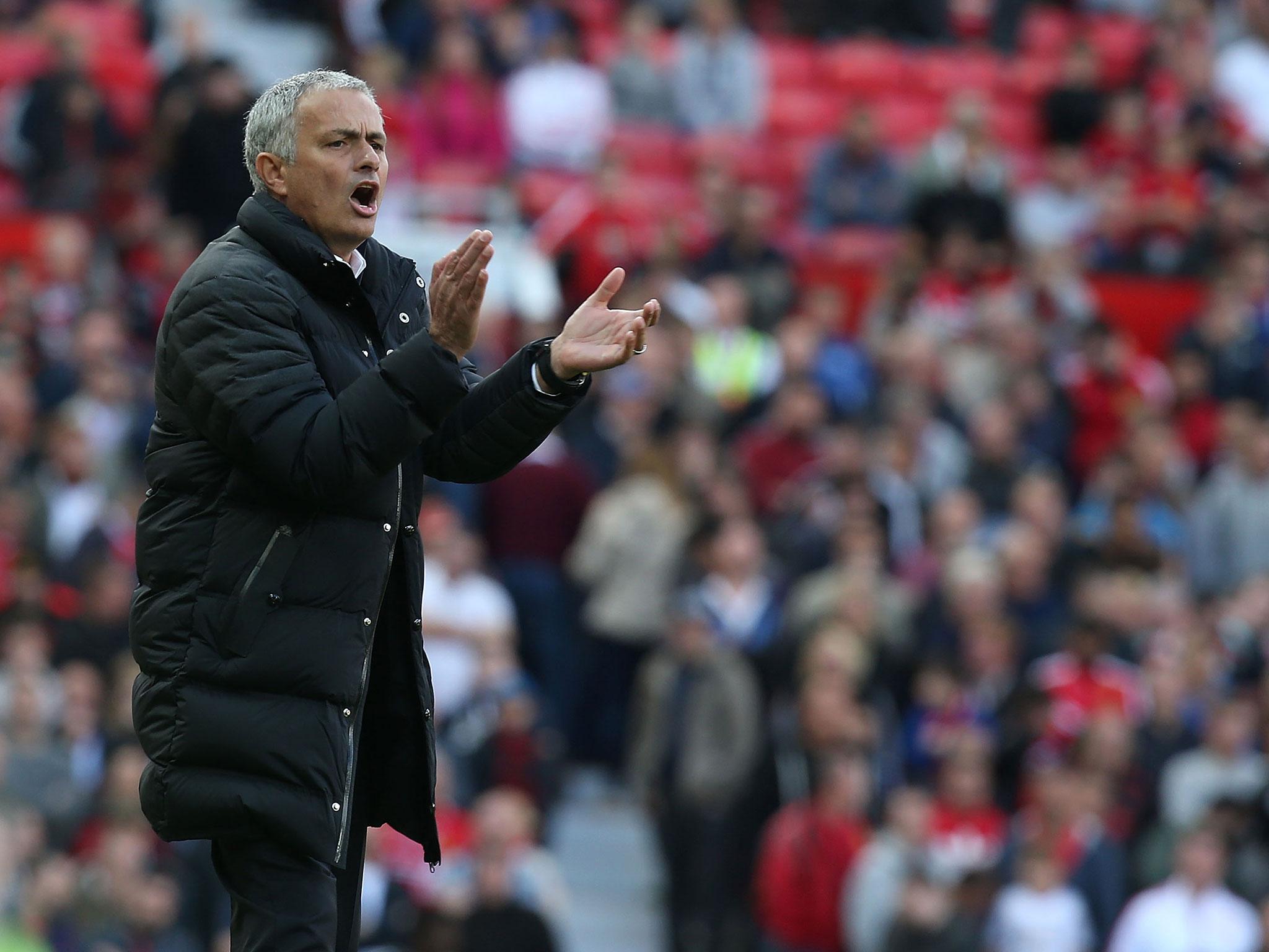 Jose Mourinho applauds his team's defensive discipline