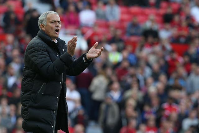 Jose Mourinho applauds his team's defensive discipline