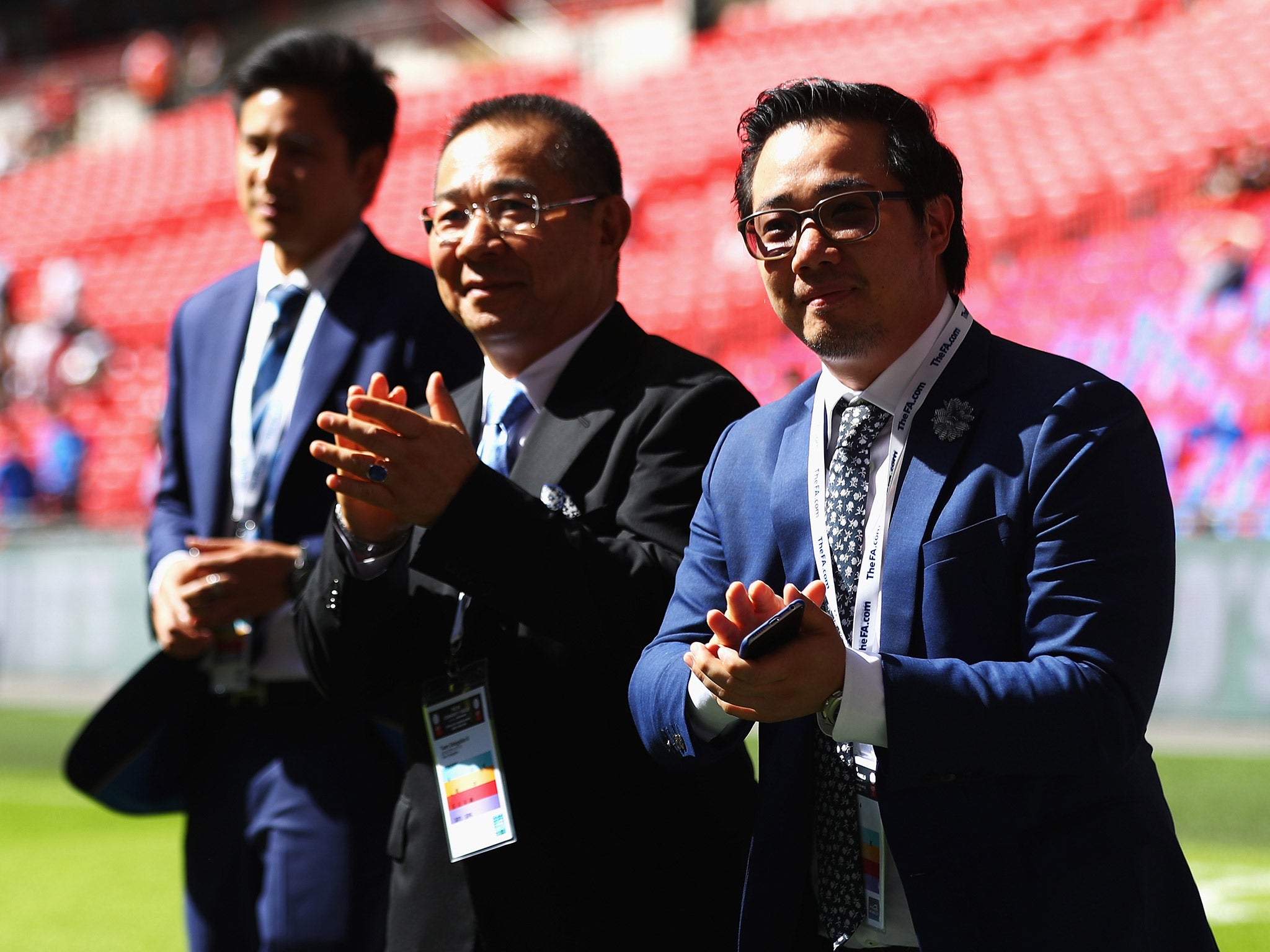 Vichai Srivaddhanaprabha (centre) will have to prove if he is different to the rest of the Premier League's managers