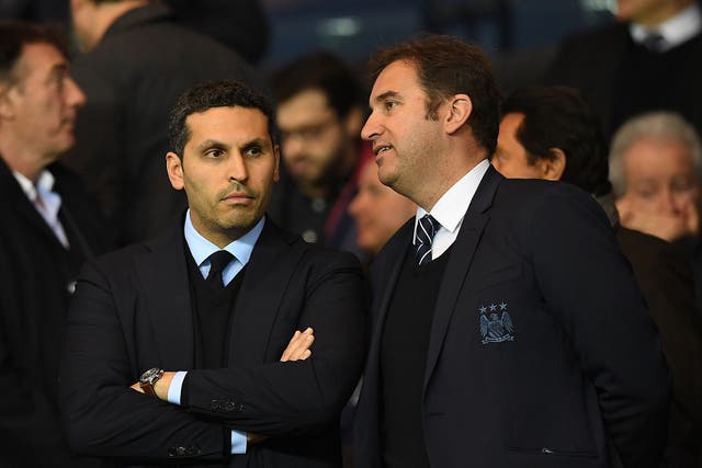 Manchester City chairman Khaldoon Al Mubarak (L) and chief executive Ferran Soriano