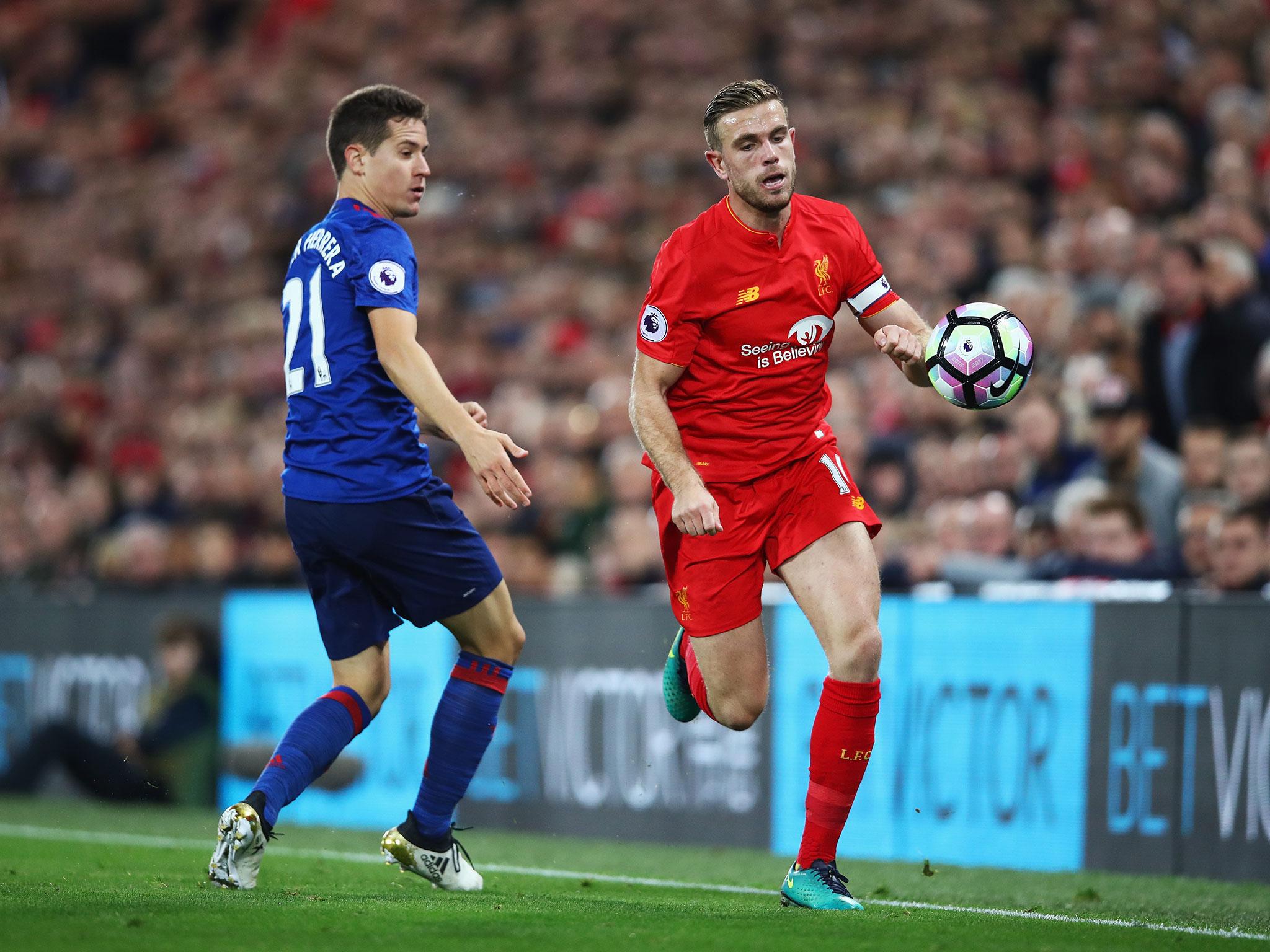 Henderson races for the ball (Getty)