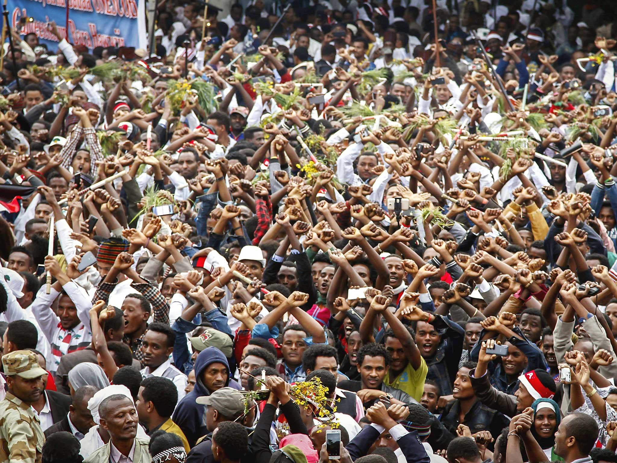 Protesters chant slogans against the government during a march in Bishoftu, in the Oromia region of Ethiopia