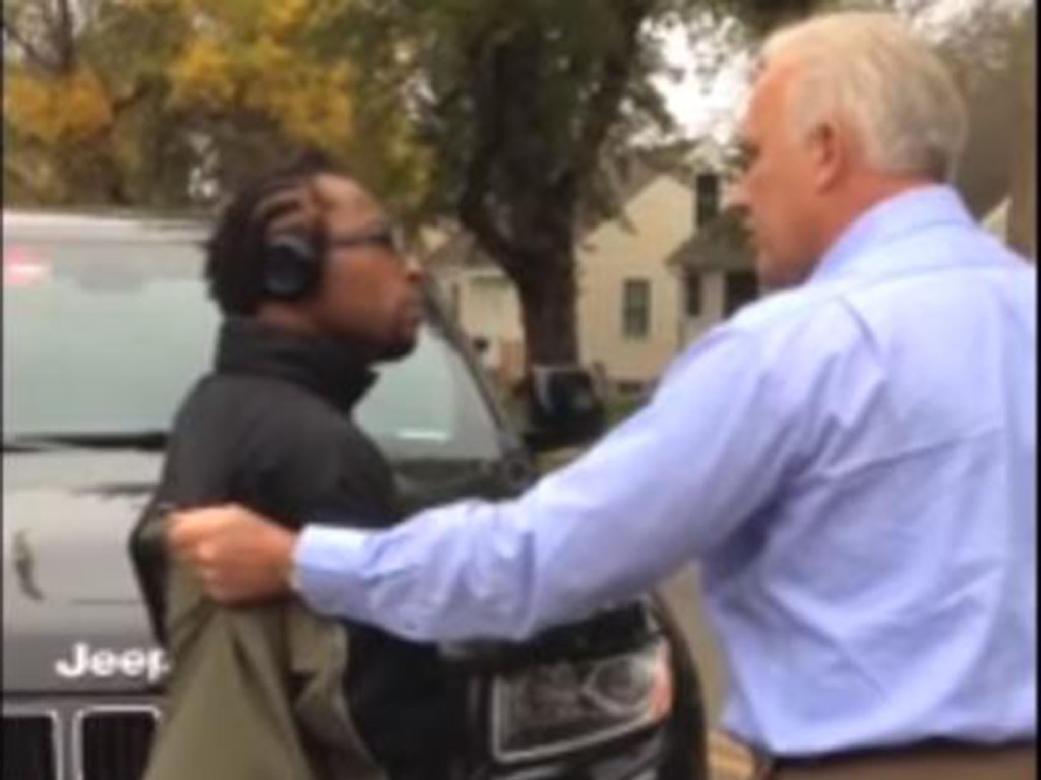 Larnie Thomas (left) was dragged down the road by his jacket by off-duty officer Tim Olson