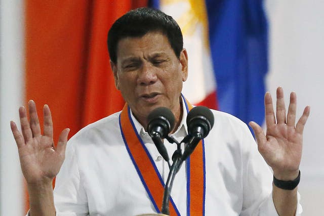 Philippine President Rodrigo Duterte says he had a message from God to stopping turning the air blue