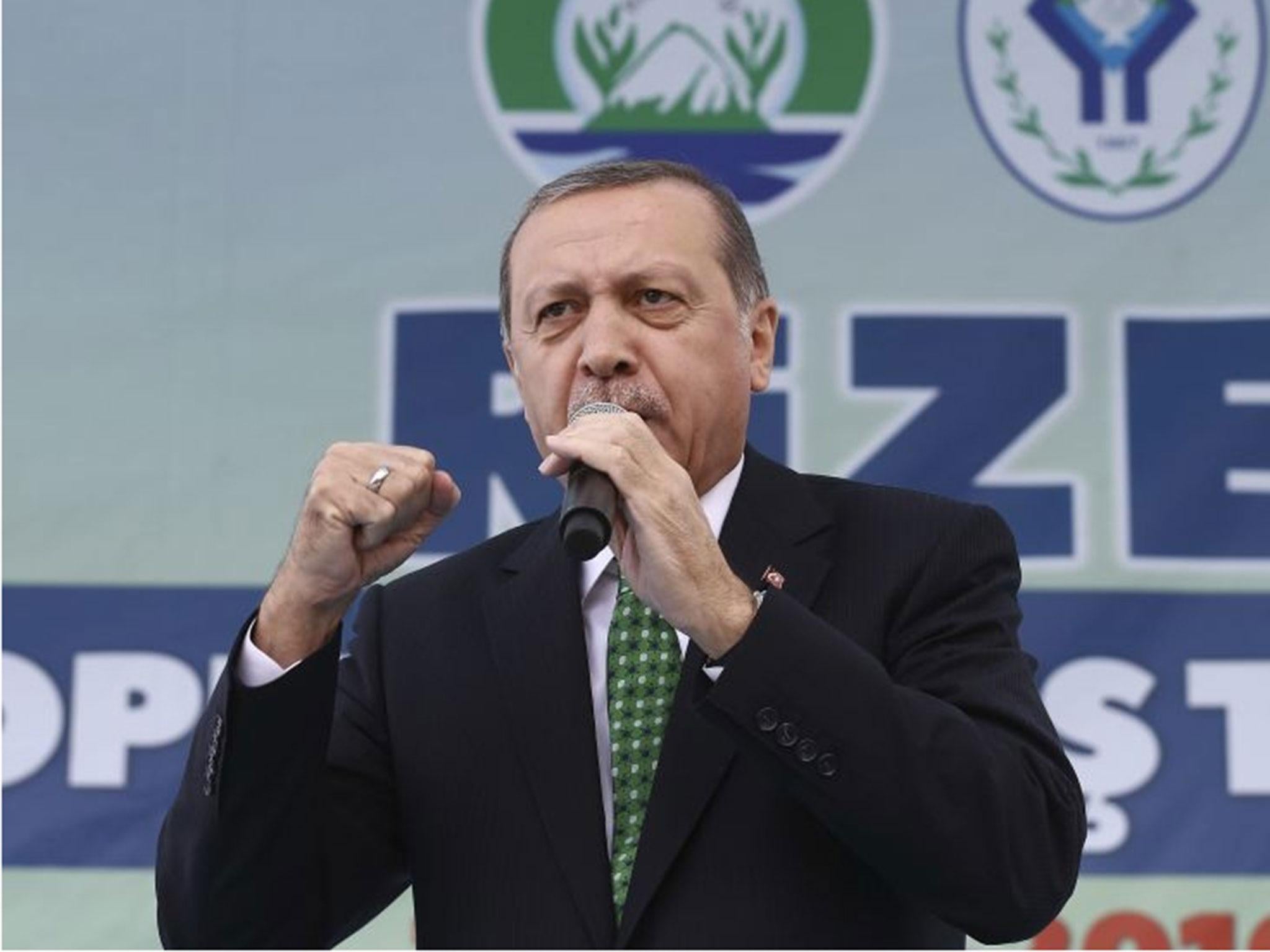 Turkish President Recep Tayyip Erdogan addresses his supporters in his hometown of Rize, on the Black Sea coast of Turkey, Saturday, 15 October, 2016
