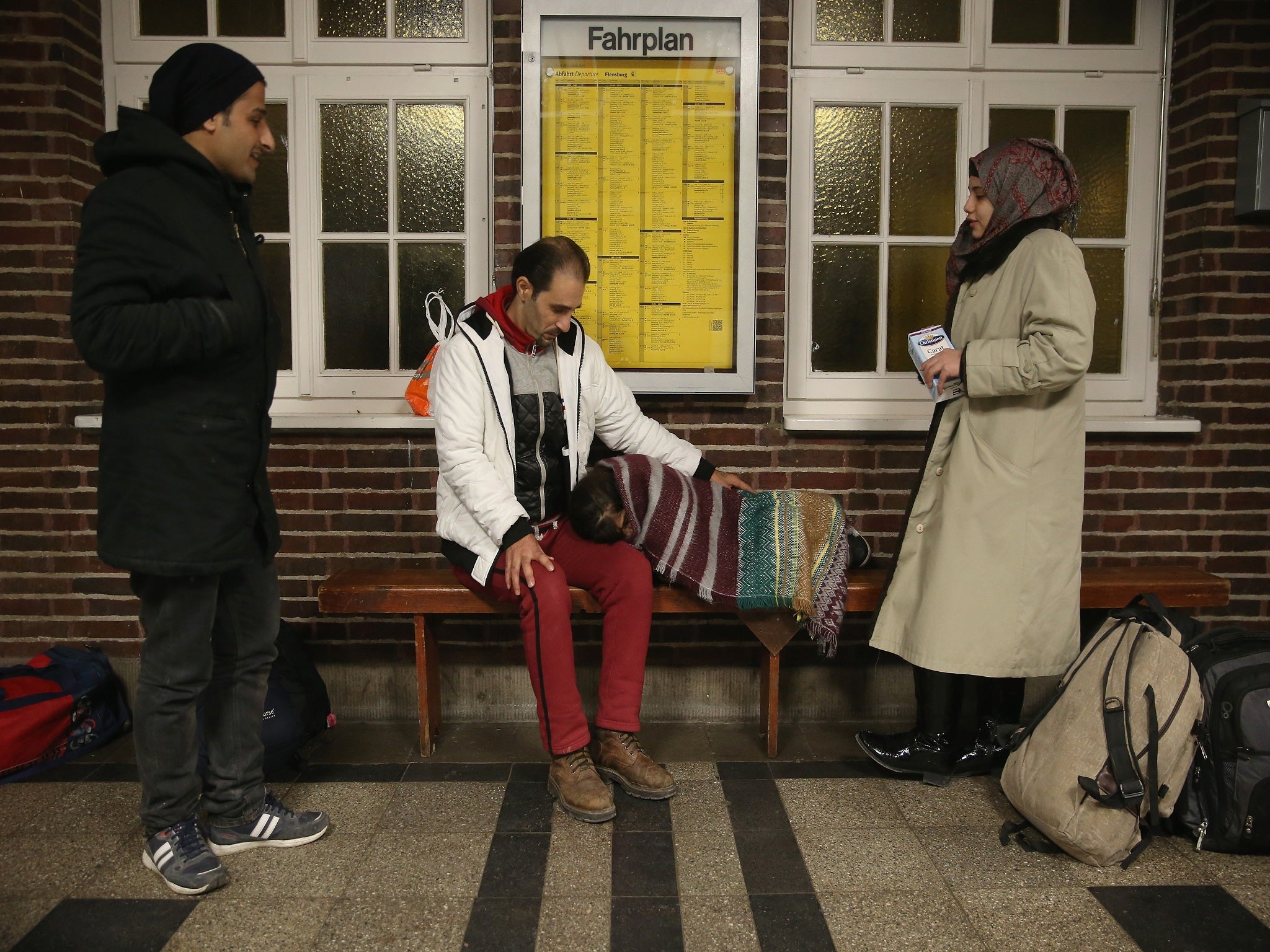 Syrian refugees pictured at the Denmark border town of Flensburg Getty
