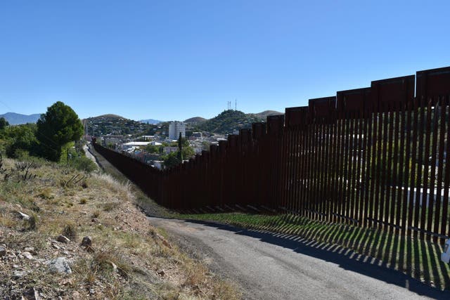 The barrier that cuts through Nogales, on the border of Arizona and Mexico, was first constructed under the Clinton administration