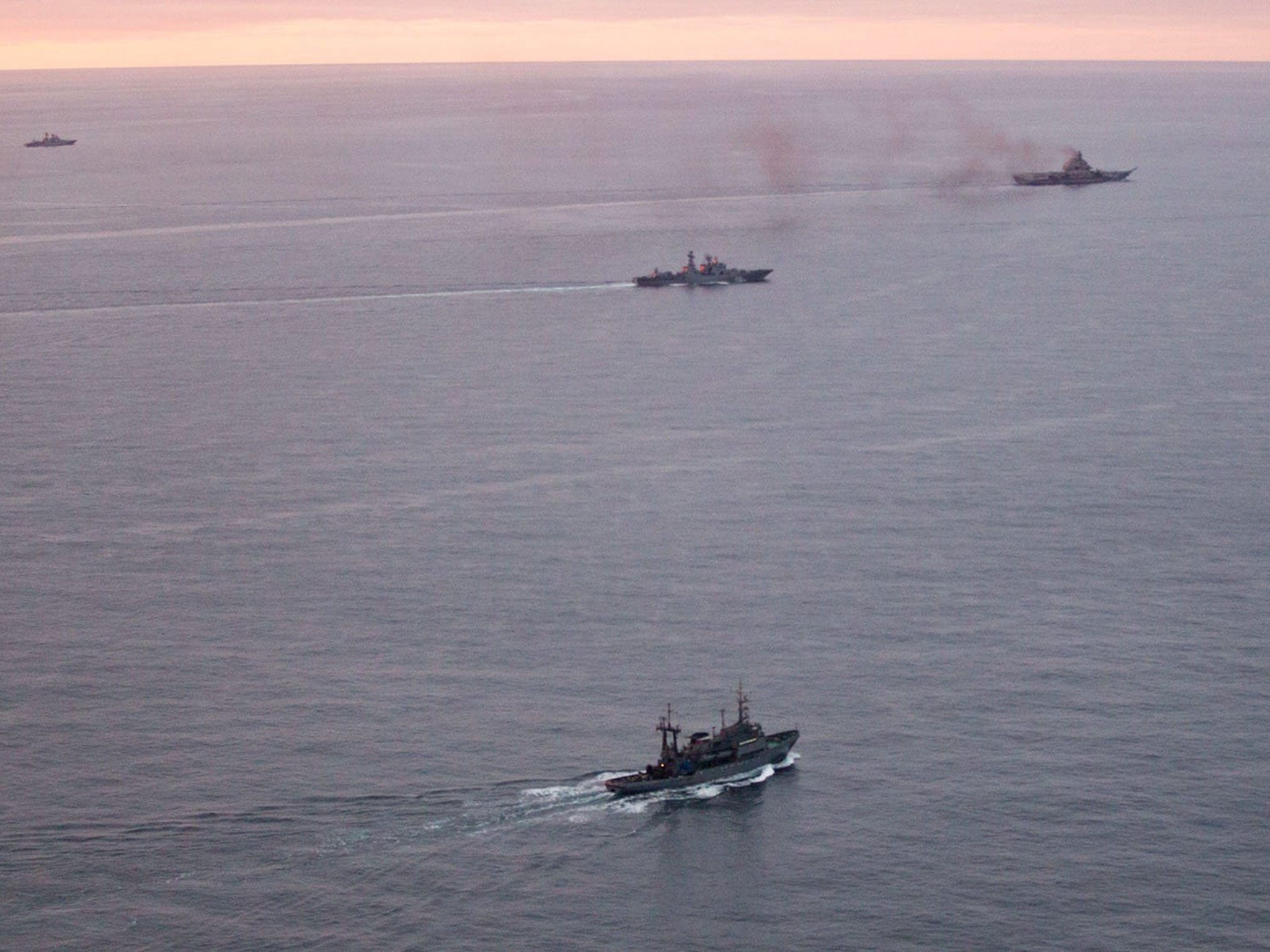 A photo taken from a Norwegian surveillance aircraft shows a group of Russian navy ships in international waters off the coast of Northern Norway on October 17, 2016.