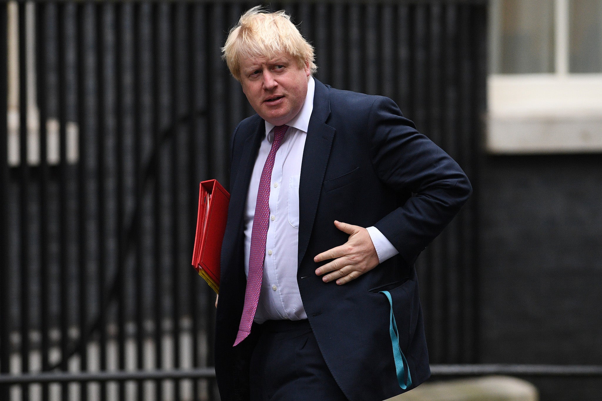 Boris Johnson arrives for the weekly cabinet meeting at 10 Downing Street in London on October 18, 2016