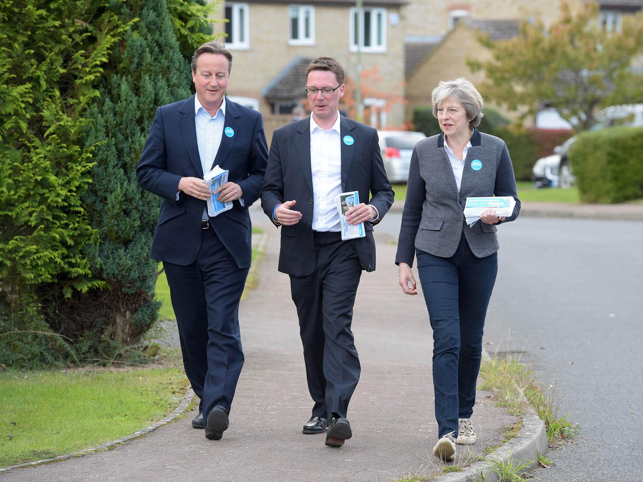 Prime Minister Theresa May campaigns with former PM David Cameron (left) and Robert Courts, the victorious Conservative candidate for the Witney by-election