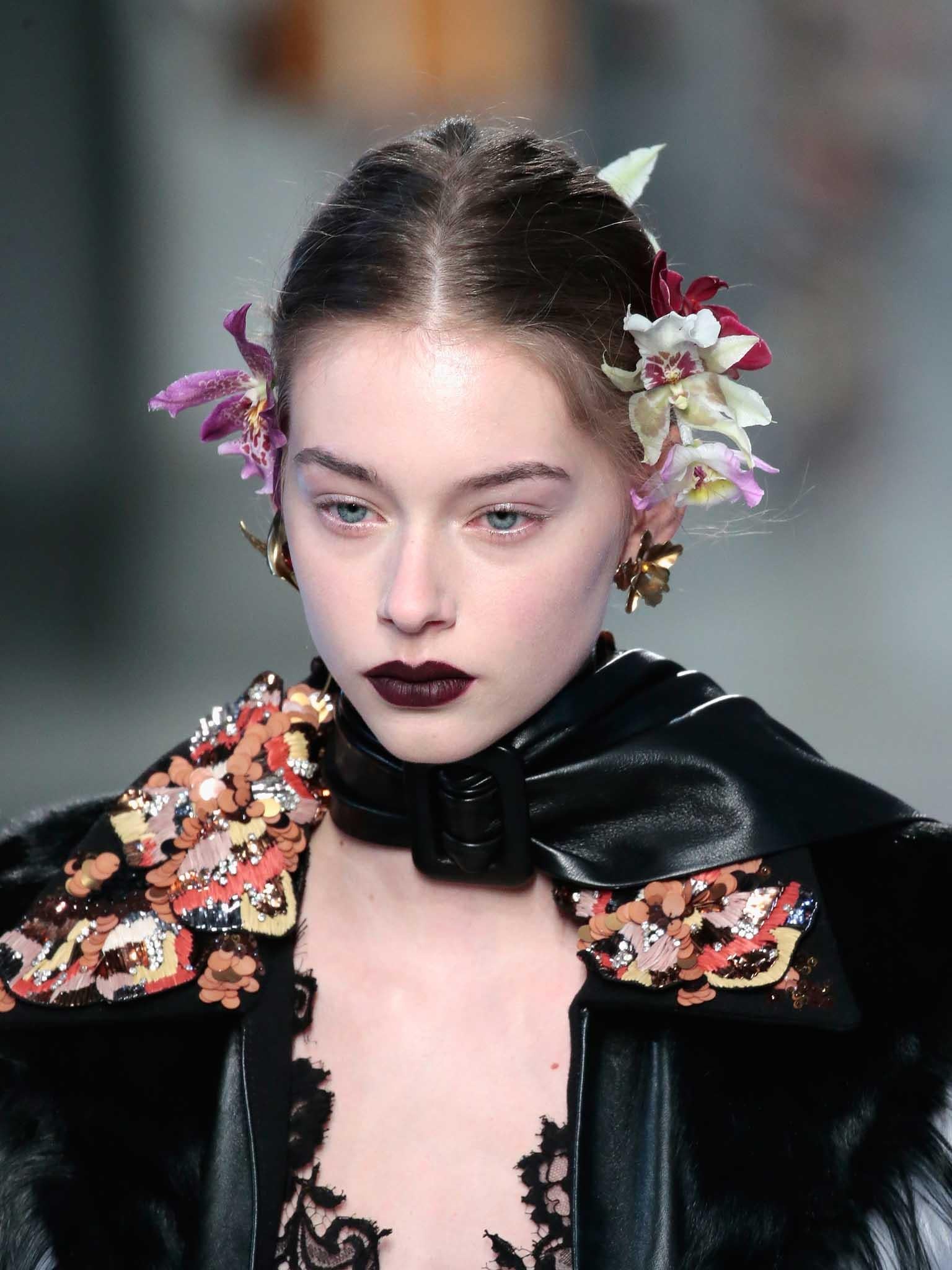 The matte trend persists, with this no-shine shade of merlot in the Rodarte Autumn Winter 2016 show (Getty)