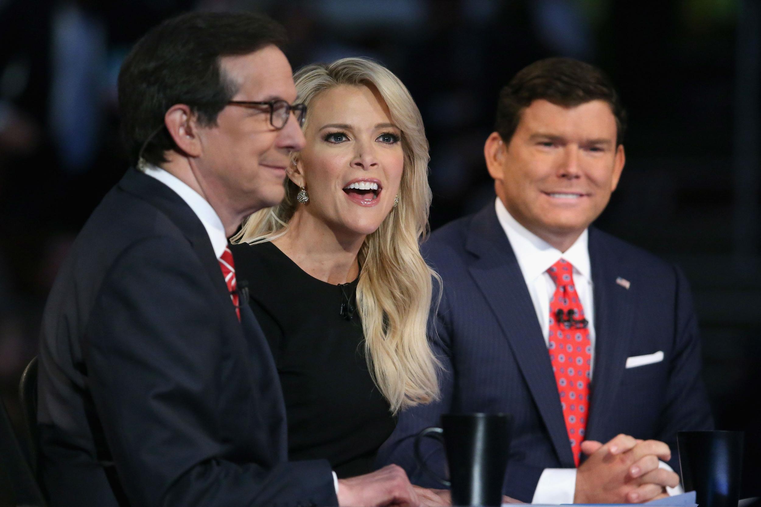 Chris Wallace, left, moderating a primary debate in January with colleagues Megyn Kelly and Bret Baier