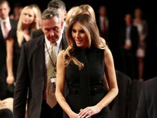 Melania Trump grabs attention with pussy-bow top... again
