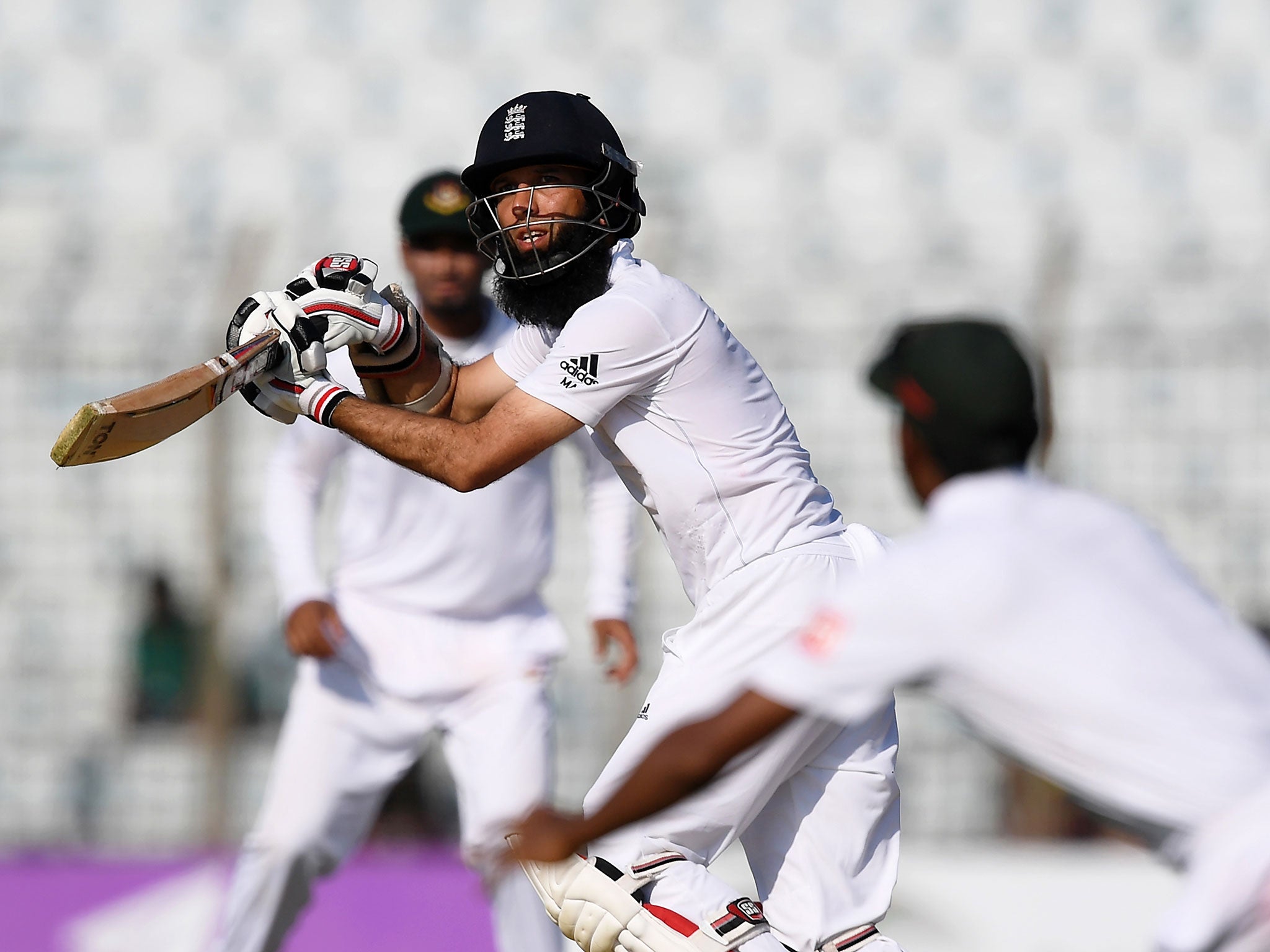 Moeen Ali plays a shot during the first day of the first Test match between Bangladesh and England at Zahur Ahmed Chowdhury Cricket Stadium
