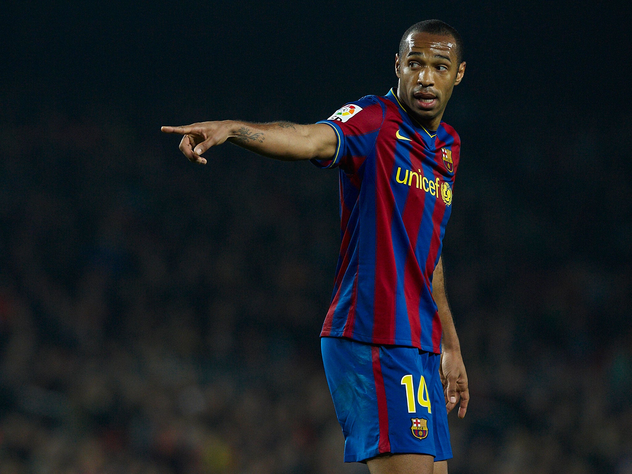 Thierry Henry was pushed out wide by Guardiola during his spell at Barcelona