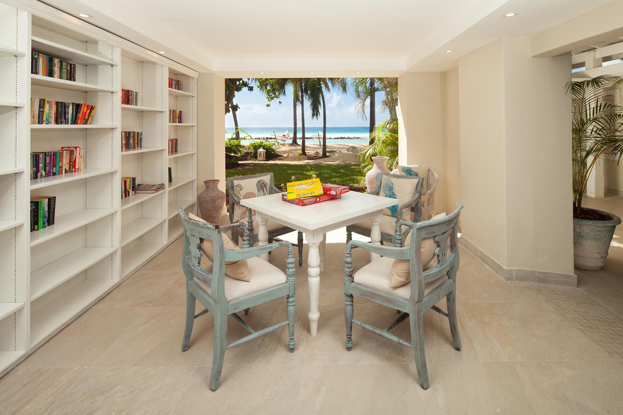 &#13;
Cosy up with a good book in the beachfront lounge at Sugar Bay&#13;