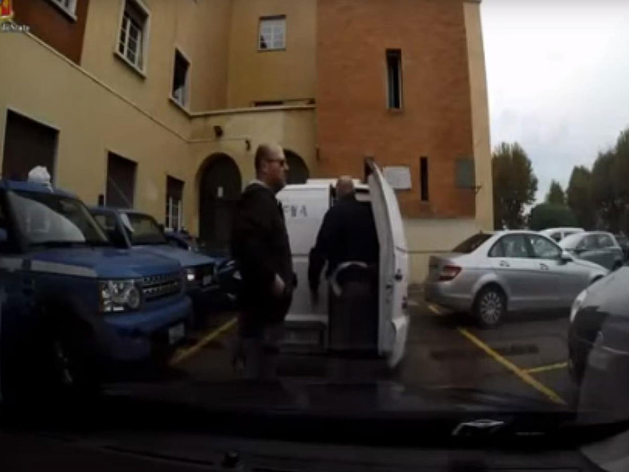 Italian police freeing 17 migrants from a refrigerated van in Ventimiglia, Italy