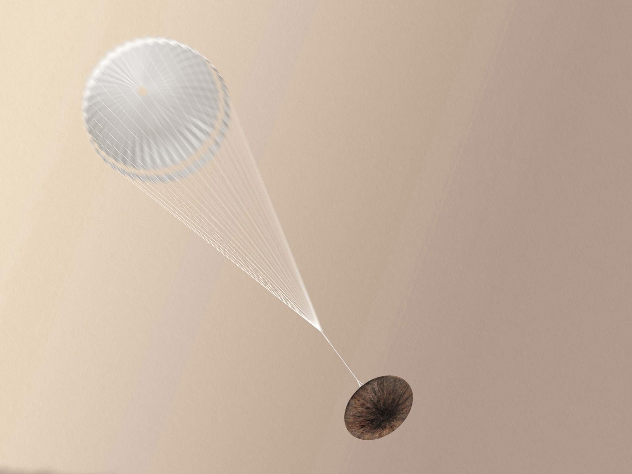 European Space Agency (ESA),based at Darmstadt, Germany showing the Schiaparelli module after the parachute has been deployed. ESA report on 20 October 2016 that essential data from the ExoMars Schiaparelli lander sent to its mothership Trace Gas Orbiter during the moduleís descent to the Red Planetís surface