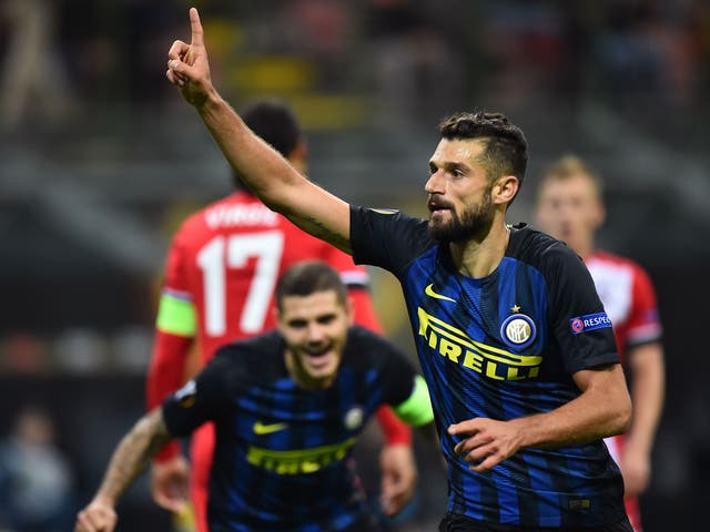 Candreva celebrates his second-half strike at the San Siro