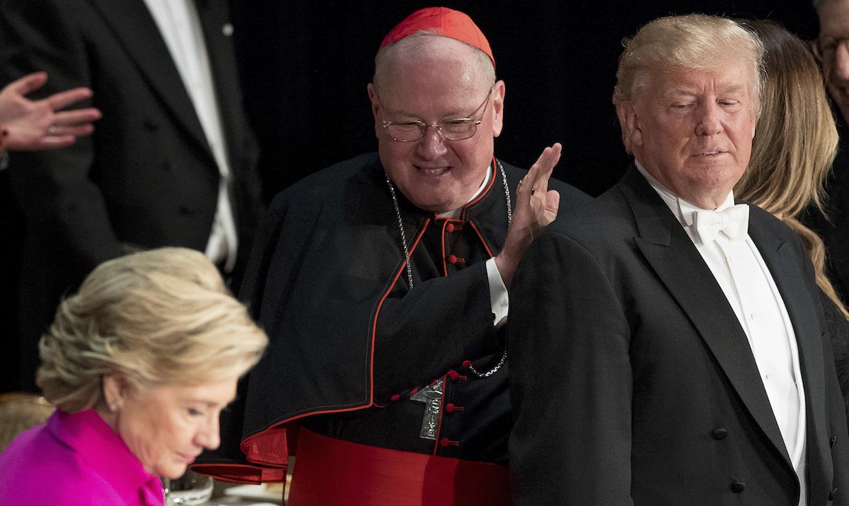 Hillary Clinton, Cardinal Timothy Dolan and Donald Trump arrive at the 71st annual Alfred E. Smith Memorial Foundation Dinner at the Waldorf Astoria hotel in New York.