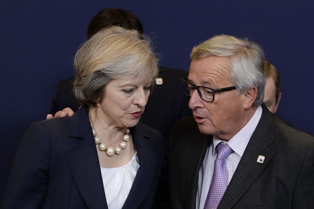 Theresa May with Jean-Claude Juncker at the European Council summit meeting in Brussels