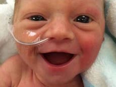 Premature baby girl wins title of 'happiest baby in the world'
