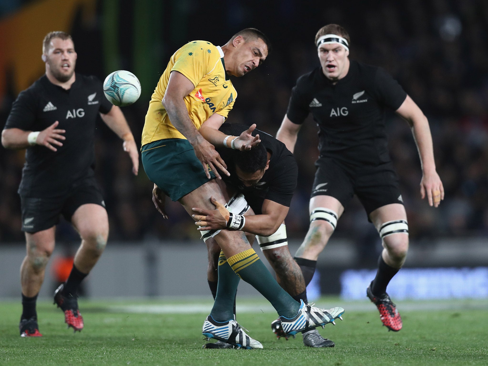 Jerome Kaino halts Rory Arnold to dislodge the ball