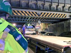 26 people injured as roof ripped off London bus in bridge crash