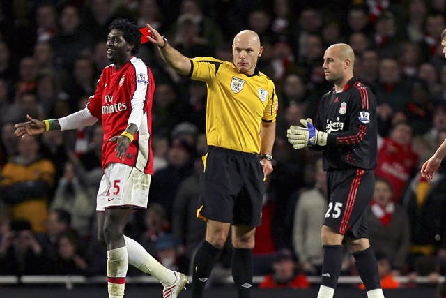 Webb dismisses Arsenal's Emmanuel Adebayor during a match against Liverpool in 2008