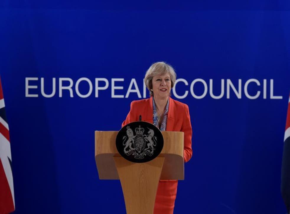 Theresa May holds a news conference after the EU summit in Brussels on Friday