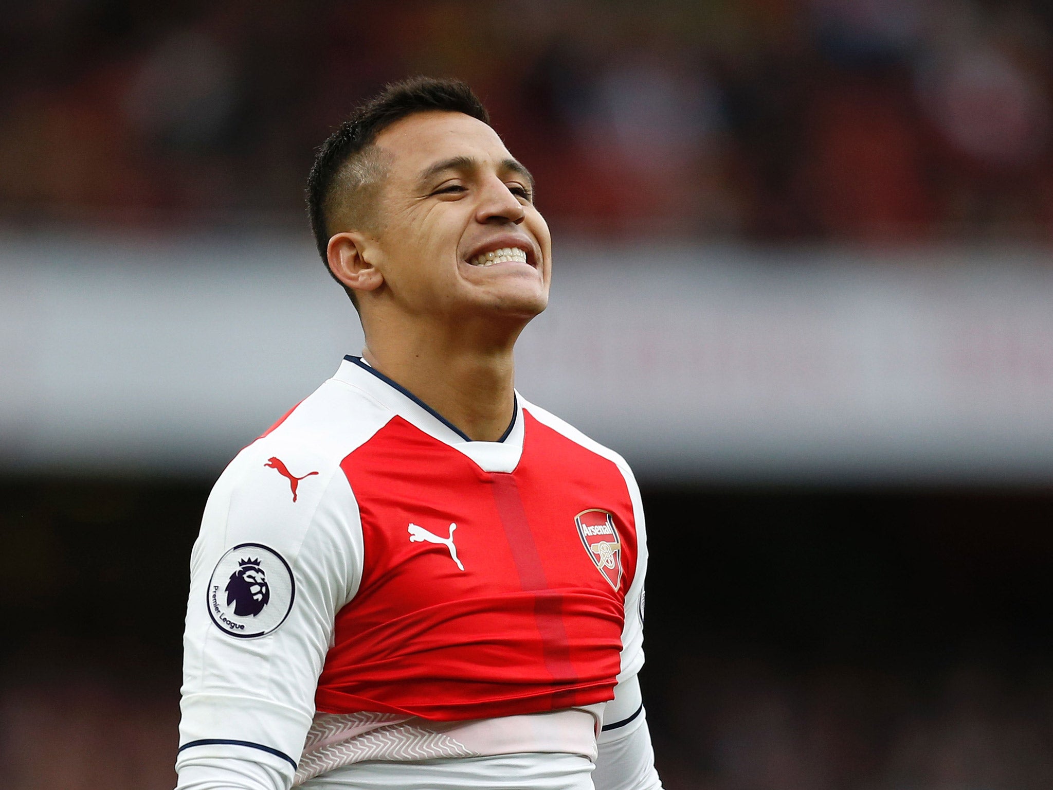 Alexis Sanchez reacts after missing a chance for Arsenal