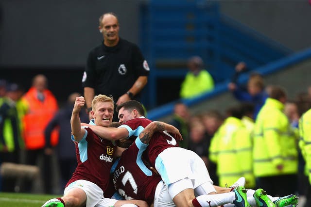 Burnley players celebrate after Scott Arfield's winner against Everton