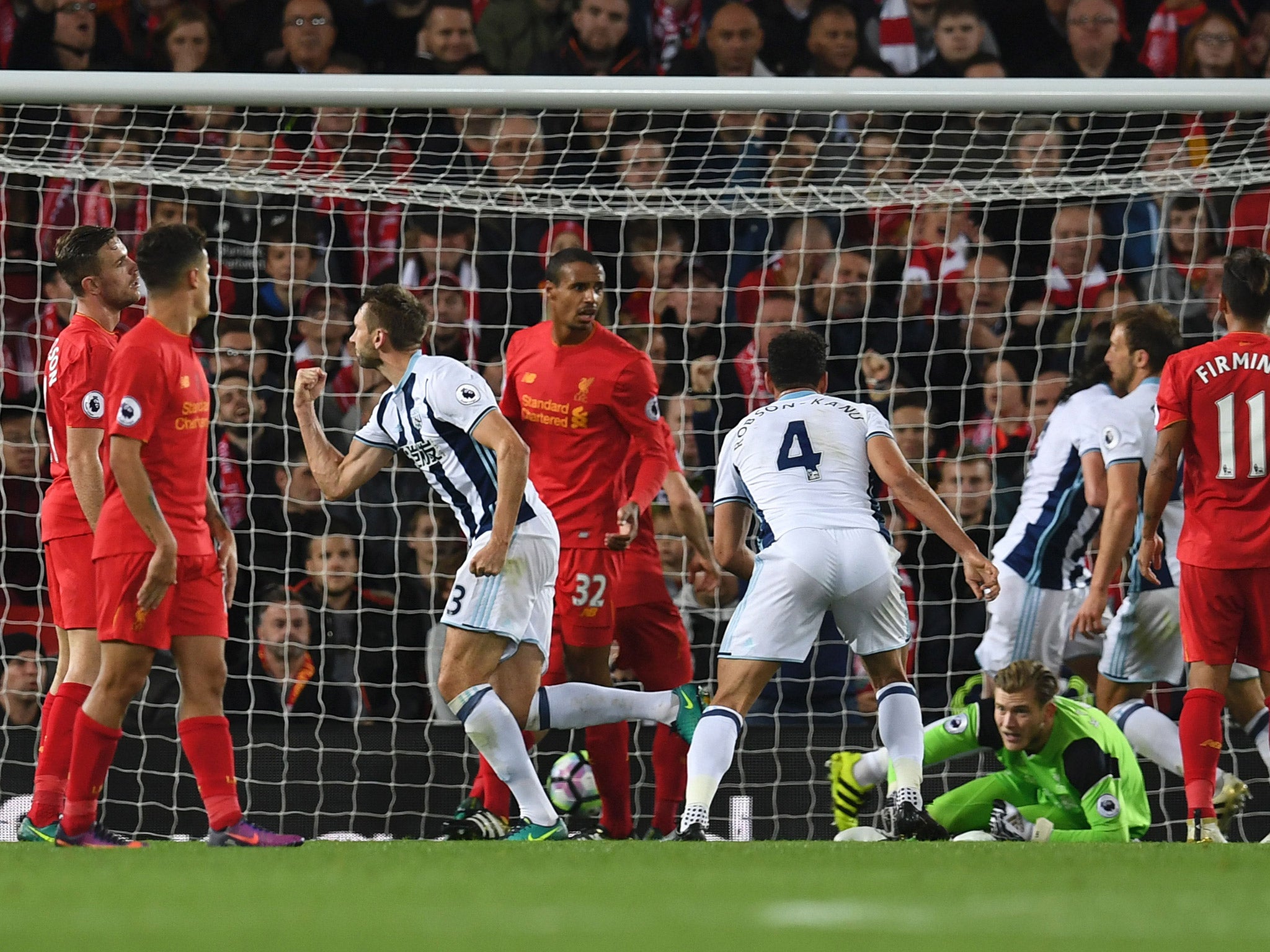 Gareth McAuley celebrates scoring West Brom's consolation goal