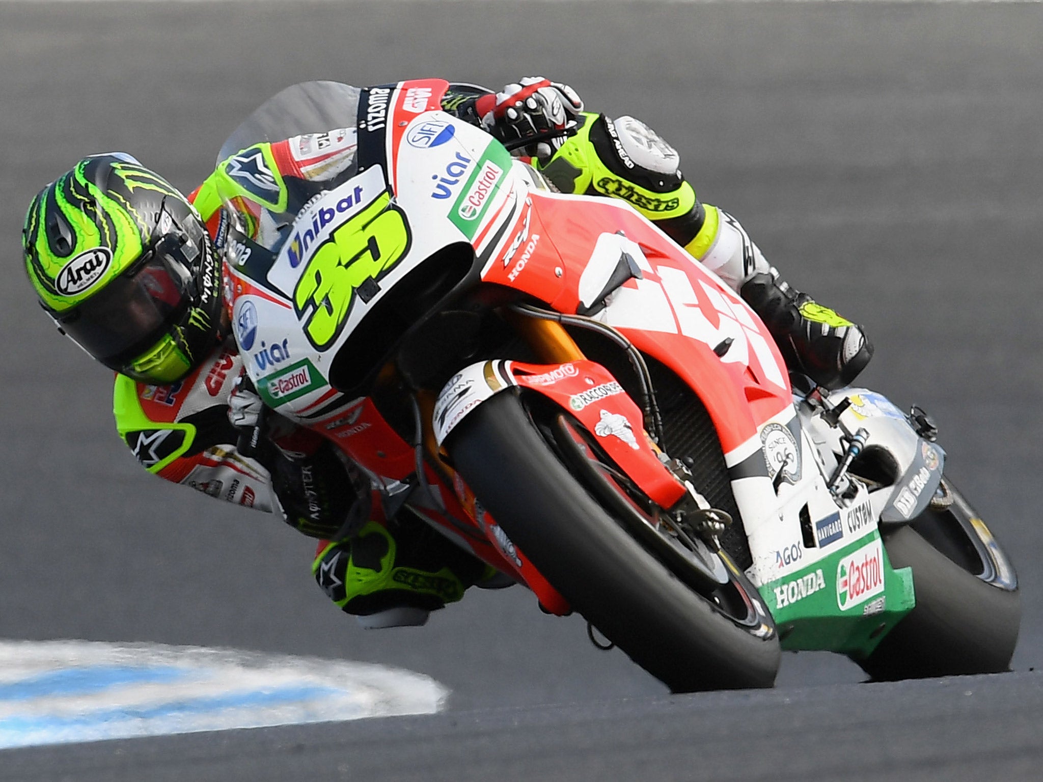 Crutchlow took the lead when Marquez crashed out on lap nine