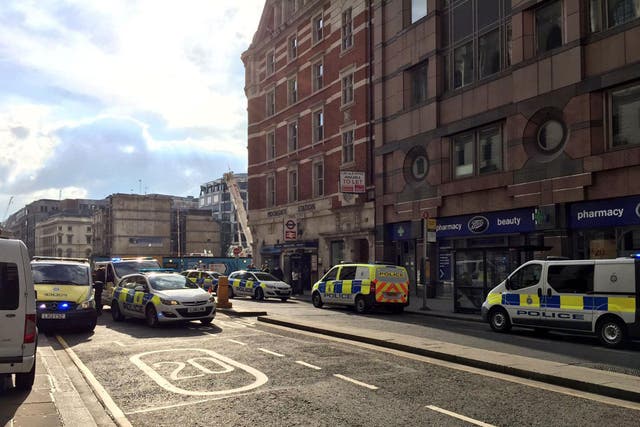 Police cars surround Moorgate station after it was evacuated