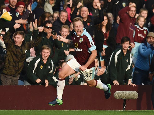 Scott Arfield believes Burnley can turn Turf Moor into a fortress in order to stay int he Premier League