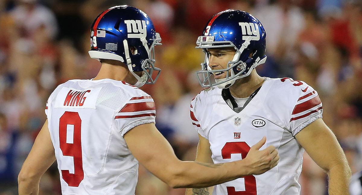 Josh Brown #3 and Brad Wing #9 of the New York Giants celebrate a field goal during a game at Raymond James Stadium on November 8, 2015 in Tampa, Florida.