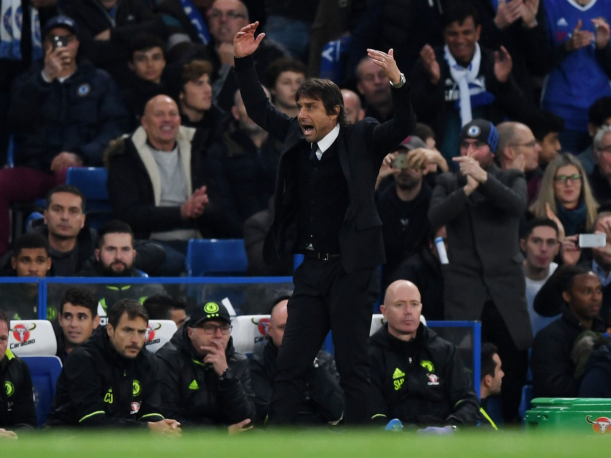Conte waves his arms and pleads for more noise at Stamford Bridge