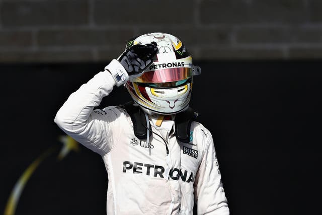 Lewis Hamilton celebrates winning the United States Grand Prix