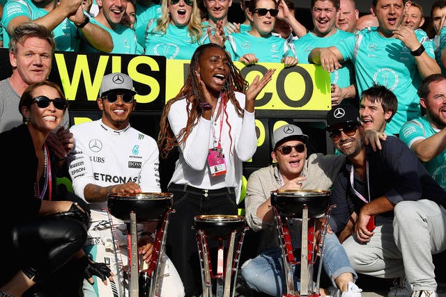 Lewis Hamilton celebrates his US Grand Prix victory with celebrity chef Gordon Ramsey