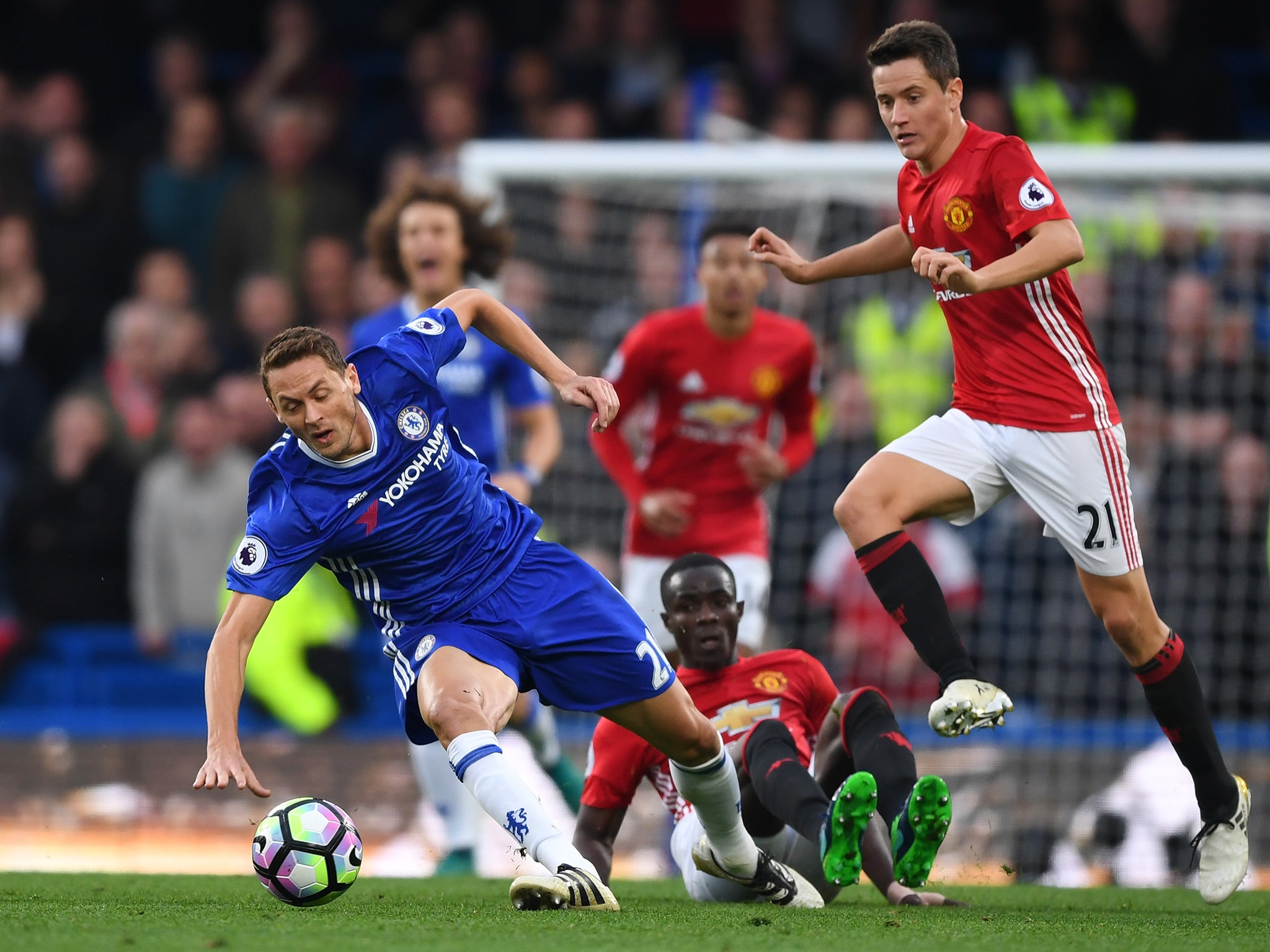 Matic jostles for the ball with United's Ander Herrera