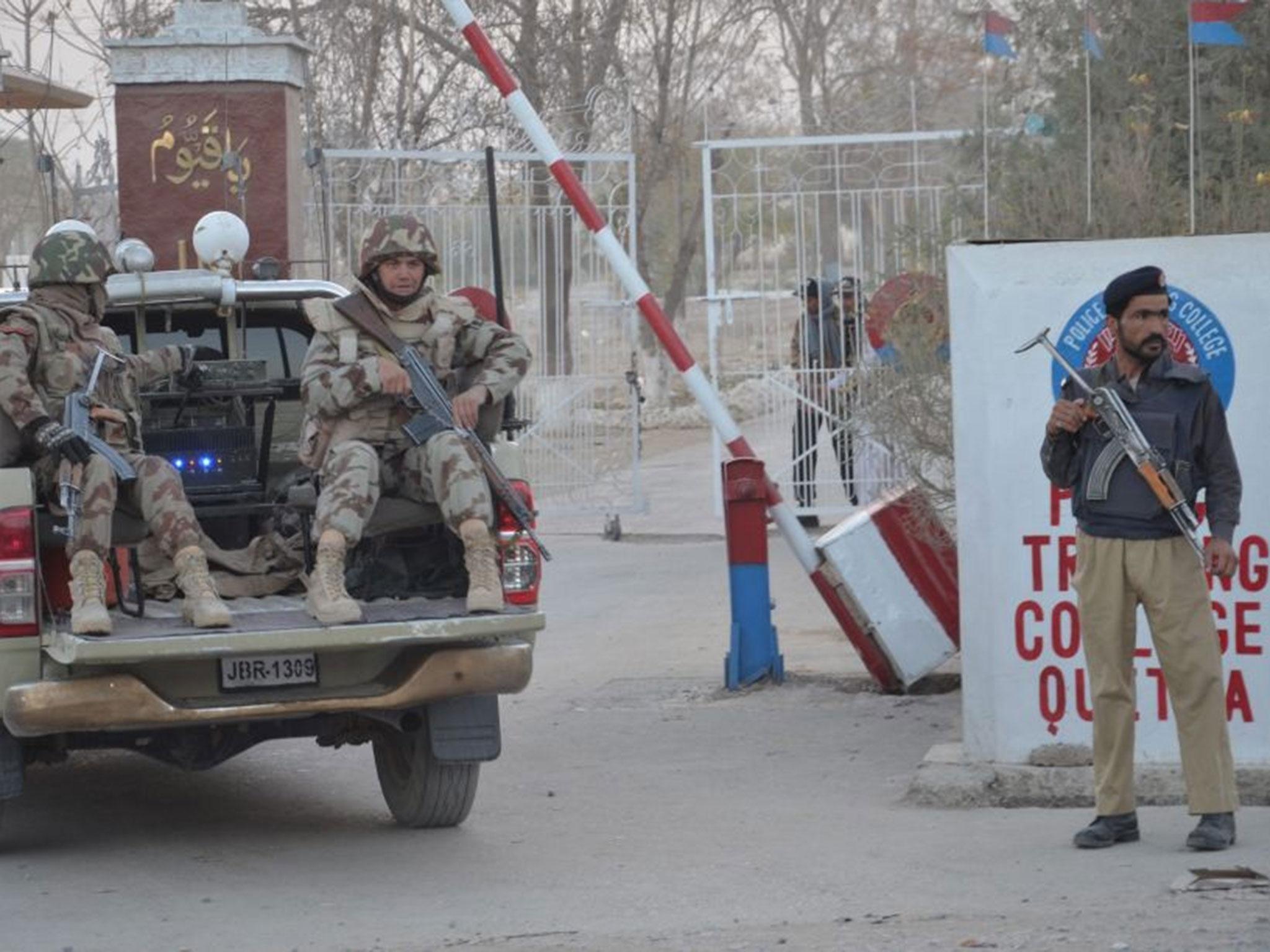 Security officials secure the Police training centre in Quetta after it was cleared of militants