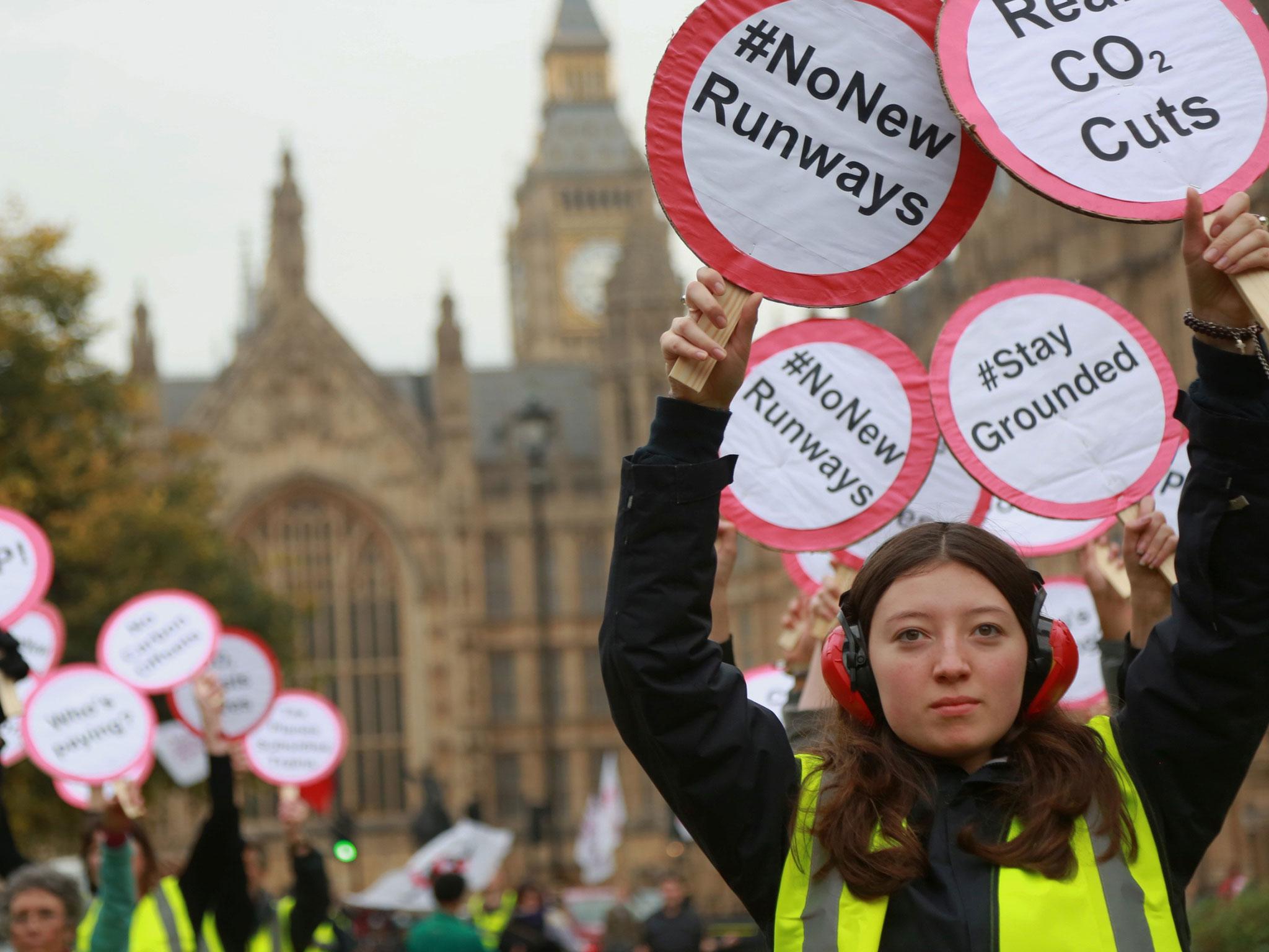 Heathrow expansion protesters gather outside Parliament