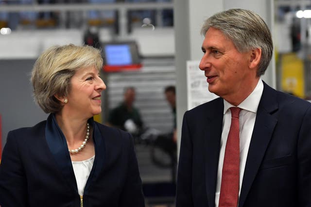 Theresa May and Philip Hammond. Hammond will unveil his Autumn Statement tomorrow at 12.30pm