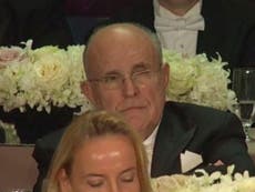 Rudy Giuliani says he was picturing Hillary Clinton in 'striped jumpsuit' while she was mocking him at Al Smith dinner