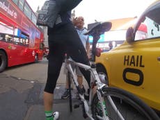 Taxi driver's foul-mouthed rant at cyclist caught on video