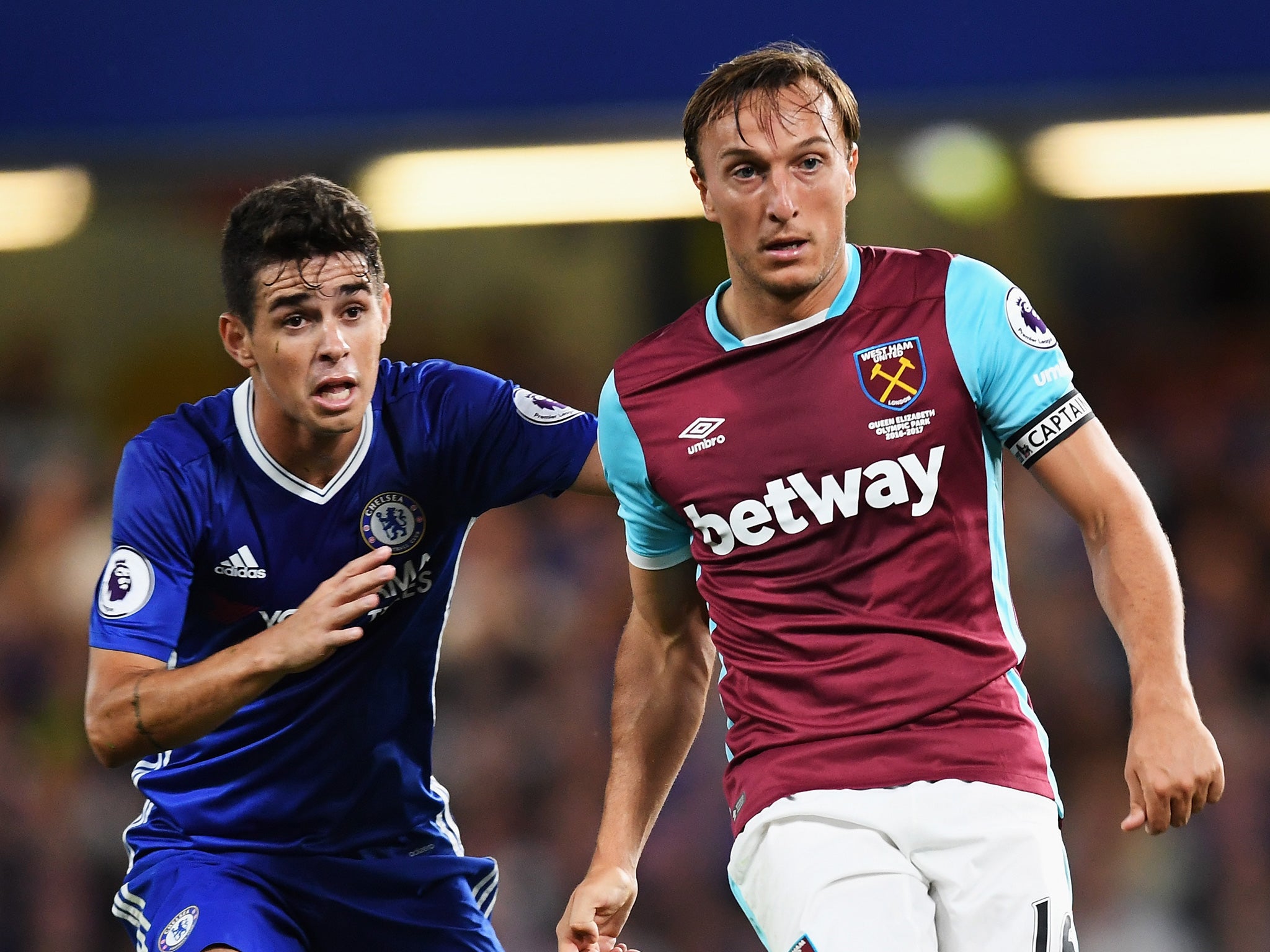 Oscar and Mark Noble during Chelsea and West Ham's meeting earlier this season